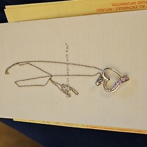 Kay Jewelers 10k white gold with pink and white sapphires.